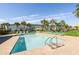 Relaxing community pool with plenty of lounge chairs at 8059 Knee Deep Rd, Kissimmee, FL 34747
