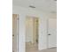 Hallway with doorways leading to other rooms at 8338 Se 178Th Deveaux Ln, The Villages, FL 32162