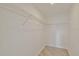Walk-in closet with metal shelving at 8338 Se 178Th Deveaux Ln, The Villages, FL 32162