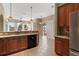 Open kitchen features stainless steel appliances, views of the water, and an open floorplan at 8920 Bridgeport Bay Cir, Mount Dora, FL 32757
