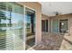 Outdoor patio with brick floor and lake view at 8920 Bridgeport Bay Cir, Mount Dora, FL 32757