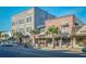 Charming street view featuring businesses with awnings and a gray building named 'The Renaissance' at 8920 Bridgeport Bay Cir, Mount Dora, FL 32757