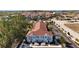 Townhouses with parking and surrounding landscape at 8988 Silver Pl, Kissimmee, FL 34747