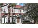 Townhouse exterior with landscaping and palm trees at 8988 Silver Pl, Kissimmee, FL 34747