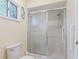 Bathroom with shower stall and grab bar at 9897 Se 178Th Pl, Summerfield, FL 34491