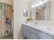 Bathroom with vanity, shower and updated look at 9897 Se 178Th Pl, Summerfield, FL 34491