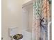 Bathroom with shower/tub combo and colorful decor at 9897 Se 178Th Pl, Summerfield, FL 34491