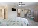 Bedroom with access to sunroom and bathroom at 9897 Se 178Th Pl, Summerfield, FL 34491