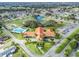 Community clubhouse with large parking area at 9897 Se 178Th Pl, Summerfield, FL 34491