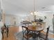 Dining room with table and kitchen view at 9897 Se 178Th Pl, Summerfield, FL 34491