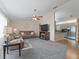 Spacious living room featuring a fireplace and open layout at 9897 Se 178Th Pl, Summerfield, FL 34491