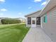Screened patio with access from backyard at 9897 Se 178Th Pl, Summerfield, FL 34491