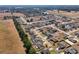 Aerial view of a residential area showing houses, streets, and surrounding landscape at 10291 Se 69Th Ter, Belleview, FL 34420