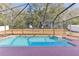 Inviting screened-in pool with ample surrounding space at 10291 Se 69Th Ter, Belleview, FL 34420