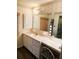 Clean bathroom with vanity, sink, and shower at 114 Chestnut St, Leesburg, FL 34748