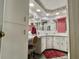 Bathroom featuring vanity with many mirrors and shower at 114 Chestnut St, Leesburg, FL 34748