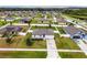 Aerial view of a house in Meadow Ridge at Grand Island community at 12018 Indian Grass Way, Leesburg, FL 34788