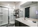 Bathroom with a large shower and modern vanity at 12018 Indian Grass Way, Leesburg, FL 34788