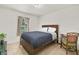 Bedroom with a double bed and a small work desk at 12018 Indian Grass Way, Leesburg, FL 34788