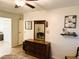 Main bedroom with dresser and large mirror at 123 Pyracantha Ln, Leesburg, FL 34748