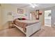 Bedroom with a double bed and ensuite bathroom at 13 Sunrise Trl, Fruitland Park, FL 34731