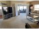 Comfortable living room with view to seating area, providing ample space for relaxation and entertainment at 13 Sunrise Trl, Fruitland Park, FL 34731