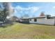 Spacious backyard with grassy area and shed at 1301 Sand Pine Ave, Ocoee, FL 34761