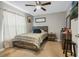 Cozy bedroom with a double bed and wood flooring at 1301 Sand Pine Ave, Ocoee, FL 34761