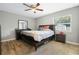 Spacious bedroom with ceiling fan and wood flooring at 1301 Sand Pine Ave, Ocoee, FL 34761