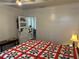 Bedroom with a red and white quilt on the bed at 13369 Cr 719, Webster, FL 33597