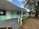 Home with a spacious porch and steps at 13369 Cr 719, Webster, FL 33597