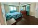 Bedroom featuring dark floors, a ceiling fan, and a double hung window at 136 Dogwood Trl, Leesburg, FL 34748