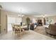 Bright dining area with a round table and chairs, adjacent to the kitchen at 1504 Aalto Pl, The Villages, FL 32159