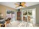 Bright sunroom with backyard access, perfect for relaxation at 1504 Aalto Pl, The Villages, FL 32159