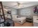 Comfortable bedroom with a queen-size bed and a TV at 1625 Virginia Dr, Clermont, FL 34711