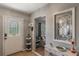 Welcoming entryway featuring a white console table and stained glass at 1625 Virginia Dr, Clermont, FL 34711