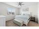 Bright bedroom featuring a king-size bed and calming decor at 17442 Blazing Star Cir, Clermont, FL 34714