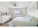 Spacious main bedroom with a king-size bed and water views at 17442 Blazing Star Cir, Clermont, FL 34714