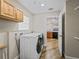 A bright laundry room featuring a new washer and dryer at 17525 Se 121St Cir, Summerfield, FL 34491