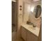 Pink bathroom with vanity, toilet, and shower/tub combo at 185 Jacaranda Dr, Leesburg, FL 34748