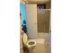 Bathroom with toilet and shower/tub combo at 185 Jacaranda Dr, Leesburg, FL 34748