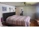 Spacious bedroom with king-size bed and ample closet space at 185 Jacaranda Dr, Leesburg, FL 34748