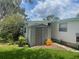 Gray plastic storage shed in backyard at 185 Jacaranda Dr, Leesburg, FL 34748