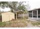 Backyard with storage shed and covered patio area at 1906 Nancy Ann Ter, Ocoee, FL 34761