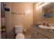 Small bathroom with tiled walls and vanity at 1906 Nancy Ann Ter, Ocoee, FL 34761