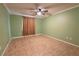 Simple bedroom with tile floors and ceiling fan at 1906 Nancy Ann Ter, Ocoee, FL 34761