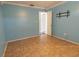 Bedroom with light blue walls and tile floors at 1906 Nancy Ann Ter, Ocoee, FL 34761