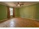 Simple bedroom with tile floors and ceiling fan at 1906 Nancy Ann Ter, Ocoee, FL 34761