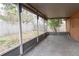 Screened porch with view of backyard at 1906 Nancy Ann Ter, Ocoee, FL 34761