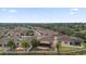 Aerial view of community, showcasing homes and landscaping at 1941 Loadstar Ave, The Villages, FL 32162